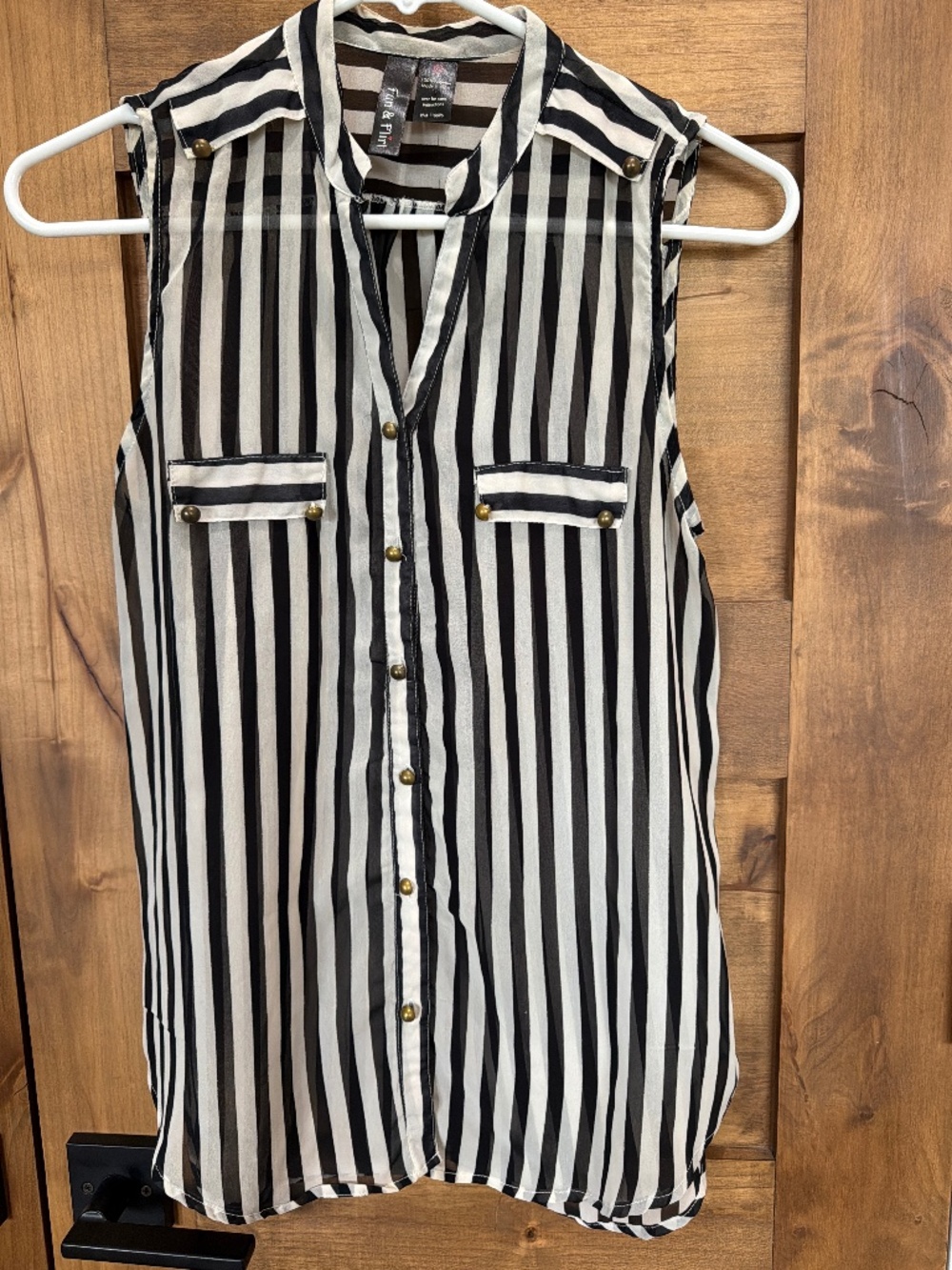 Catch attention in this sheer flowy blouse